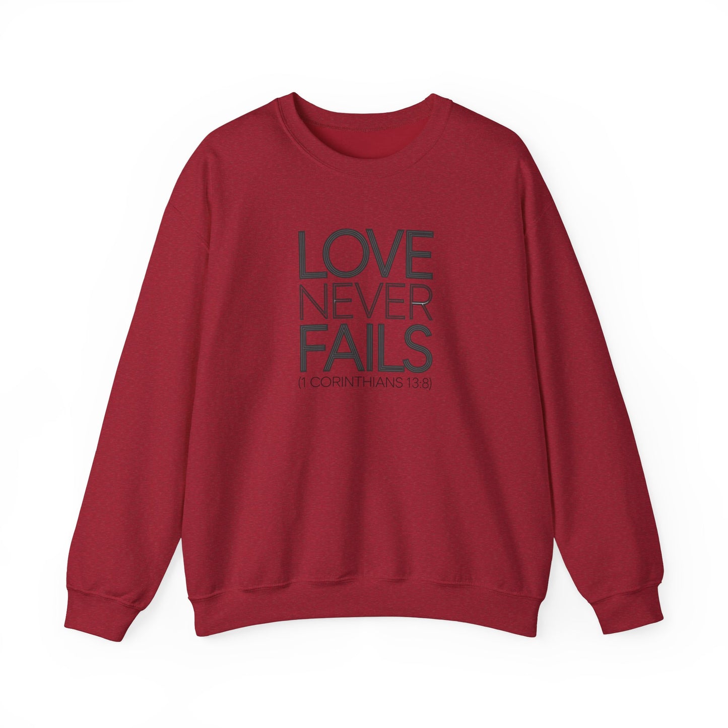 Love Never Fails  Unisex Heavy Blend™ Crewneck Sweatshirt