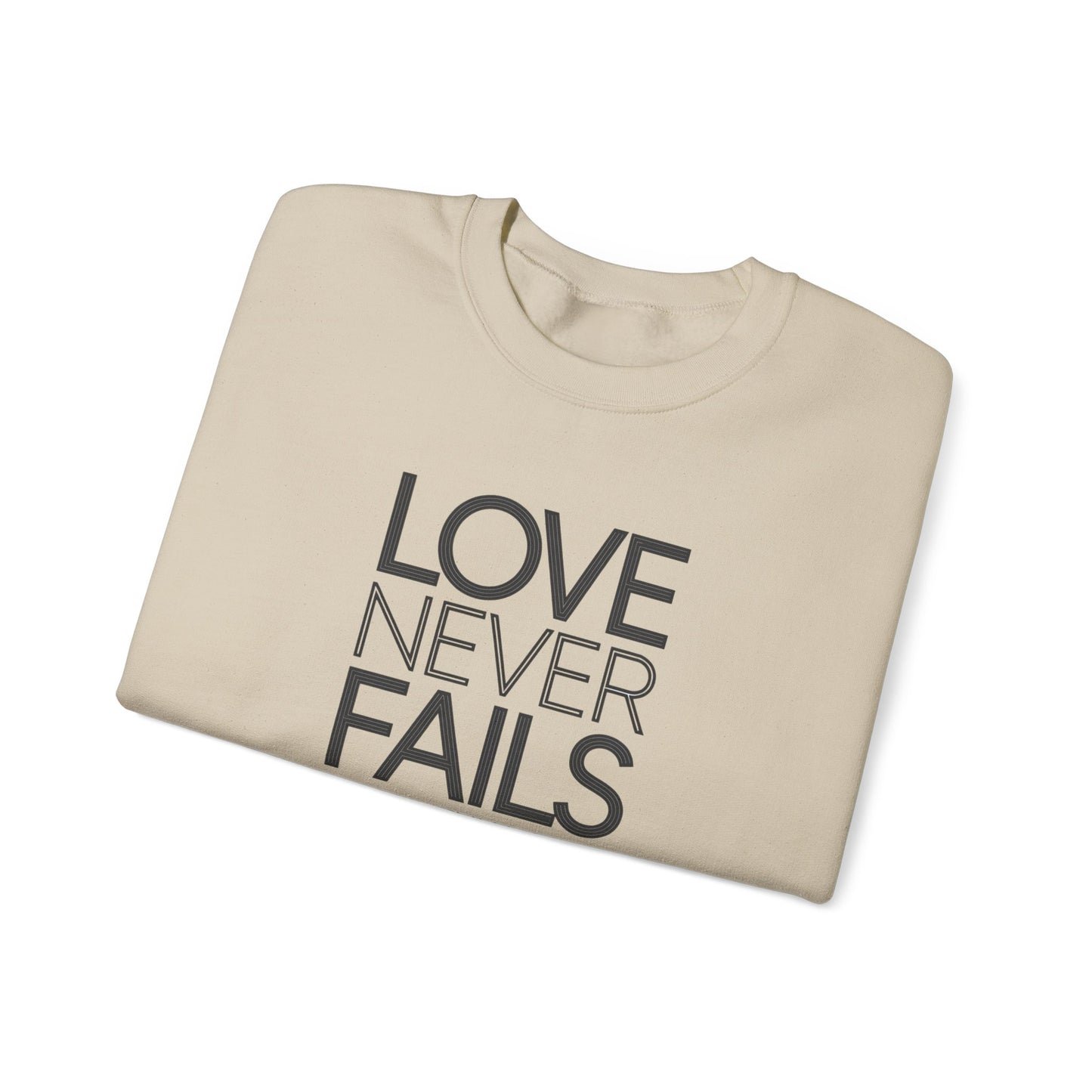 Love Never Fails  Unisex Heavy Blend™ Crewneck Sweatshirt