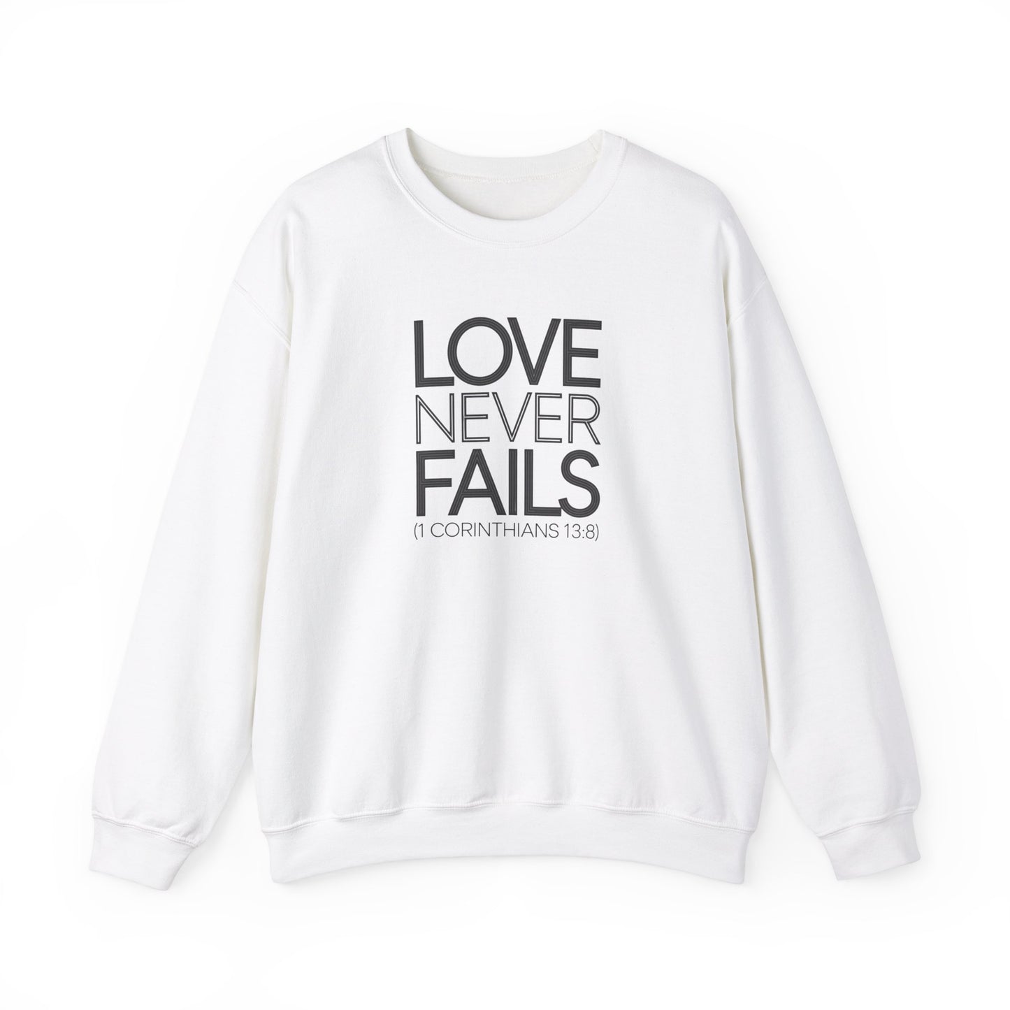 Love Never Fails  Unisex Heavy Blend™ Crewneck Sweatshirt